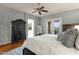Bedroom features a ceiling fan, large wardrobe, and neutral colors at 11036 E Evans Rd, Scottsdale, AZ 85255