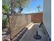 Cozy backyard with brick-lined pavers and decorative lattice, perfect for relaxing outdoors at 124 S 54Th St # 42, Mesa, AZ 85206