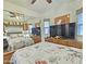 An inviting bedroom with a Paris themed comforter, tv, and mirrored closet at 124 S 54Th St # 42, Mesa, AZ 85206