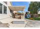 Backyard area with a built-in barbecue, play area, and covered pergola at 1901 W Mulberry Dr, Chandler, AZ 85286