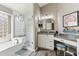 Modern bathroom featuring a large soaking tub, glass enclosed shower and a vanity at 1901 W Mulberry Dr, Chandler, AZ 85286