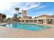 Spacious community pool area with palm trees, lounge chairs, and a covered gazebo at 1901 W Mulberry Dr, Chandler, AZ 85286