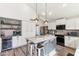 Modern kitchen with island, updated appliances and plenty of cabinet space at 1901 W Mulberry Dr, Chandler, AZ 85286
