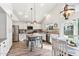 Beautiful kitchen with island, stainless steel appliances and updated lighting at 1901 W Mulberry Dr, Chandler, AZ 85286