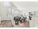 Bright and airy living room with high ceilings, arched windows, and modern decor at 1901 W Mulberry Dr, Chandler, AZ 85286