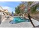 Backyard pool and patio area surrounded by lush landscaping at 1901 W Mulberry Dr, Chandler, AZ 85286