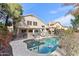 Inviting backyard pool with lounge chairs, umbrellas, and a security fence at 1901 W Mulberry Dr, Chandler, AZ 85286