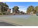 Well-kept tennis court in a community setting, perfect for active residents at 1901 W Mulberry Dr, Chandler, AZ 85286