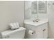 Bathroom featuring a sink, mirror, toilet, and neatly folded towels at 20218 N 33Rd Pl, Phoenix, AZ 85050