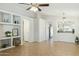 Open living room with tile flooring, built-in shelves and elegant archways at 20218 N 33Rd Pl, Phoenix, AZ 85050