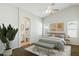 Serene main bedroom featuring soft colors, natural light, and a connecting bathroom, offering a private retreat at 20218 N 33Rd Pl, Phoenix, AZ 85050
