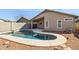 Backyard view of a sparkling pool and the back of the house at 20218 N 33Rd Pl, Phoenix, AZ 85050