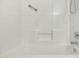 Bright shower with a tiled tub and shower combo at 20218 N 33Rd Pl, Phoenix, AZ 85050