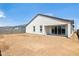 Large backyard showcasing the home's exterior and block wall surround at 25606 N 154Th Ln, Surprise, AZ 85387
