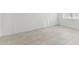 Bright bedroom featuring ceramic tile flooring and natural light from a window at 25606 N 154Th Ln, Surprise, AZ 85387