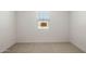 Comfortable and well-lit carpeted bedroom with a window at 25606 N 154Th Ln, Surprise, AZ 85387