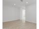 Spacious room with ceramic tile and white walls, offering versatile design options at 25606 N 154Th Ln, Surprise, AZ 85387