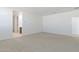 Large room with neutral carpet providing comfort and versatility at 25606 N 154Th Ln, Surprise, AZ 85387