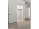 Well-organized walk-in closet with ample storage space, featuring a sturdy rod for hanging clothes and space for shoes at 25606 N 154Th Ln, Surprise, AZ 85387