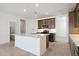 Bright kitchen with a large island, stainless steel appliances, and modern cabinetry at 25606 N 154Th Ln, Surprise, AZ 85387