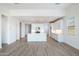Open concept kitchen with a large island, modern appliances, and white cabinetry at 25606 N 154Th Ln, Surprise, AZ 85387