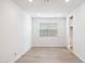 Bright living room showcasing recessed lighting, fresh paint and wood-look flooring at 25606 N 154Th Ln, Surprise, AZ 85387