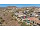 Aerial view of a property highlighting its location, pool, solar panels, and landscaping in a residential neighborhood at 25932 N 104Th Dr, Peoria, AZ 85383