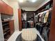 Walk-in closet with extensive shelving and storage options at 30227 N 124Th Dr, Peoria, AZ 85383