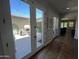 Hallway with backyard view and french doors that allows plenty of natural light at 30227 N 124Th Dr, Peoria, AZ 85383