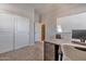 Spacious office with carpet, white board, and closet with white doors at 30227 N 124Th Dr, Peoria, AZ 85383