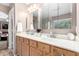 Bright and airy bathroom with double sinks, a large mirror, and a luxurious feel at 32795 N Hidden Canyon Dr, San Tan Valley, AZ 85144