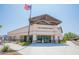San Tan Heights Center boasts an American flag and manicured landscaping in a clean and inviting setting at 32795 N Hidden Canyon Dr, San Tan Valley, AZ 85144