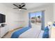 Bright bedroom with a large window, carpeted floors, and a closet at 4220 E Everett Dr, Phoenix, AZ 85032