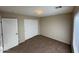 Bedroom featuring carpet, a window, and closet, providing a comfortable living space at 4943 W Lynne Ln, Laveen, AZ 85339