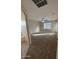 Spacious main bedroom with carpet, a ceiling fan, and lots of natural light from the windows at 4943 W Lynne Ln, Laveen, AZ 85339
