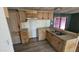 Interior shot of a kitchen area with dated features and a dual basin stainless steel sink at 508 S 98Th St, Mesa, AZ 85208