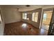 Living area with wood floors and large windows allowing for natural light at 508 S 98Th St, Mesa, AZ 85208
