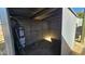 This metal shed features a water heater for added utility and corrugated metal walls and ceiling for durability at 508 S 98Th St, Mesa, AZ 85208