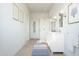 Bright bathroom with a glass shower, white vanity, and attractive accent art at 520 E Aurora Dr, San Tan Valley, AZ 85140
