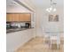 Eat-in kitchen featuring granite countertops, stainless steel appliances, and a breakfast nook at 525 N Miller Rd # 113, Scottsdale, AZ 85257