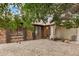 Brick and stucco exterior with desert landscaping and an inviting covered porch at 8201 W Tuckey Ln, Glendale, AZ 85303