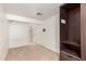 Bedroom with carpet, neutral wall, walk-in closet, and closet organizer at 8310 W Daley Ln, Peoria, AZ 85383