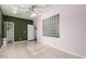Spacious bonus room with tile floors, natural light and glass block window at 8310 W Daley Ln, Peoria, AZ 85383