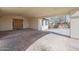 A spacious covered parking area that leads to an elegant double-door entrance at 8310 W Daley Ln, Peoria, AZ 85383