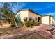 Exterior shot of a two-story building with outdoor staircase and awning-shaded windows at 8310 W Daley Ln, Peoria, AZ 85383