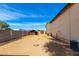 Outside view of home with recreational vehicle and additional storage buildings at 8310 W Daley Ln, Peoria, AZ 85383