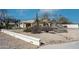 Desert-style home exterior featuring native landscaping with cacti and gravel at 8310 W Daley Ln, Peoria, AZ 85383