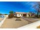 Charming single-story home with well-maintained landscaping and a welcoming driveway at 8310 W Daley Ln, Peoria, AZ 85383