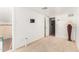 Neutral room with carpet, and a wall-mounted tv mount at 8310 W Daley Ln, Peoria, AZ 85383