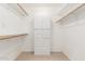 Walk-in closet with built-in shelving and ample storage space at 8310 W Daley Ln, Peoria, AZ 85383